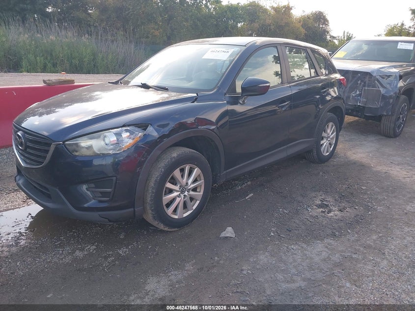 2016 Mazda Cx-5 Sport, Левый бок, IAAI, VIN JM3KE4BY8G0801491 — фото 2