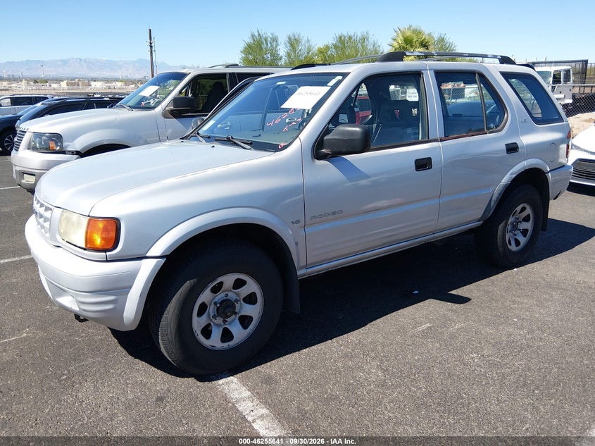 1999 Isuzu Rodeo Ls/Lse/S 3.2L, Normal Wear & Tear, IAAI, VIN 4S2CK58W3X4327299 — photo 2