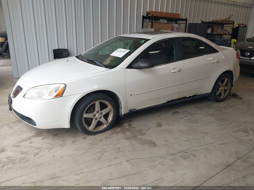 PONTIAC G6 2006 VIN 1G2ZG558X64265576