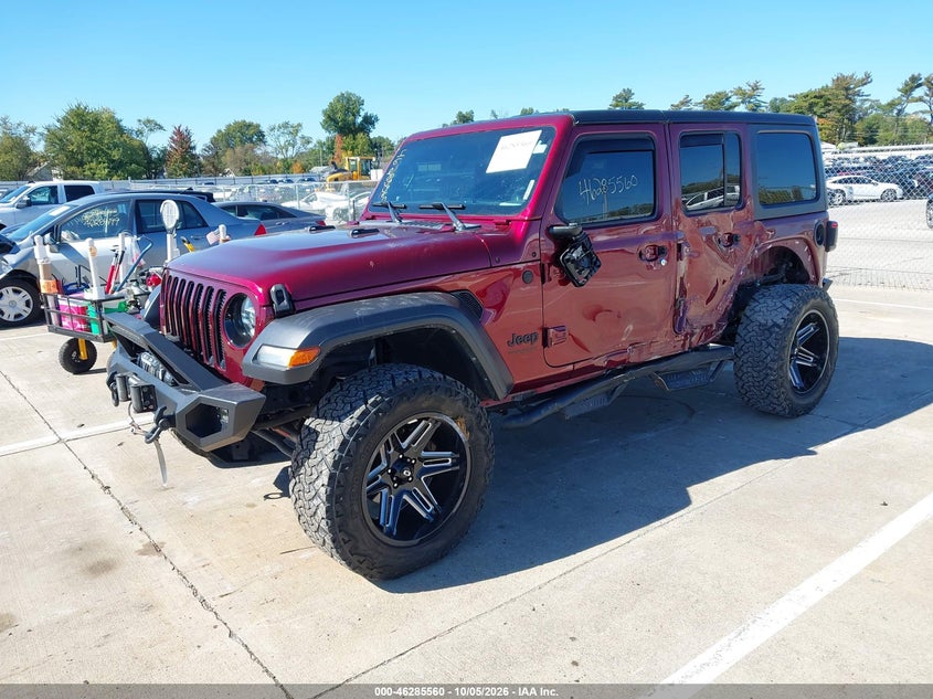 2021 Jeep Wrangler Unlimited Sport Altitude 4X4, Левый бок, IAAI, VIN 1C4HJXDG9MW692441 — фото 2