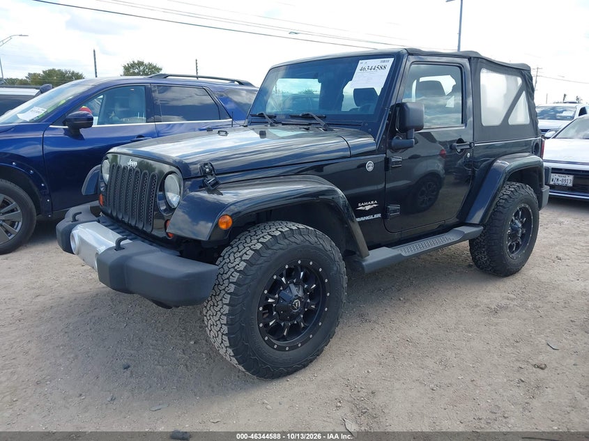 2011 Jeep Wrangler Sahara, Обычный износ, IAAI, VIN 1J4AA5D17BL628005 — фото 2