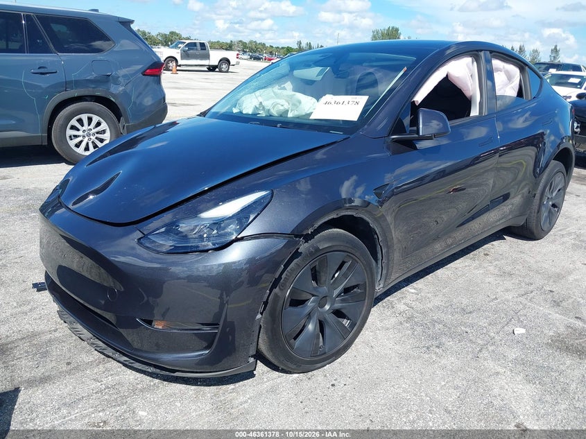2025 Tesla Model Y Long Range Dual Motor Rear-Wheel Drive, Левый бок, IAAI, VIN 7SAYGDED9SA373611 — фото 2