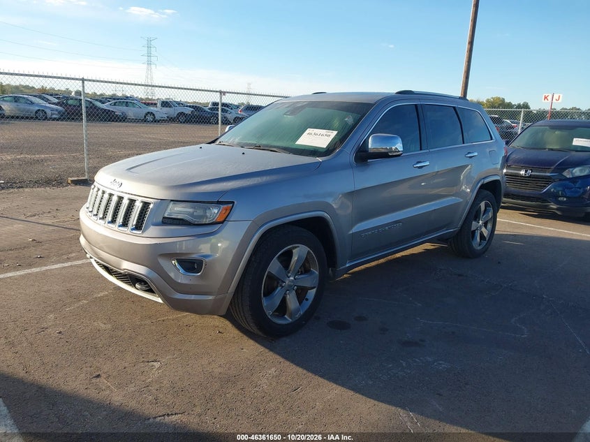 2014 Jeep Grand Cherokee Overland, Левый бок, IAAI, VIN 1C4RJECG5EC180012 — фото 2