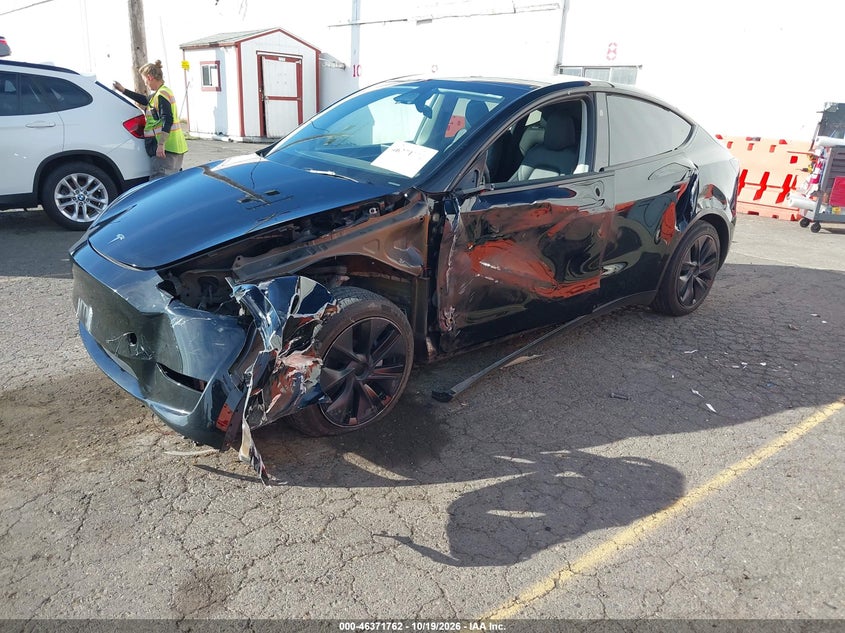 2024 Tesla Model Y Long Range Dual Motor All-Wheel Drive, Left Side, IAAI, VIN 7SAYGAEE3RF121633 — photo 2