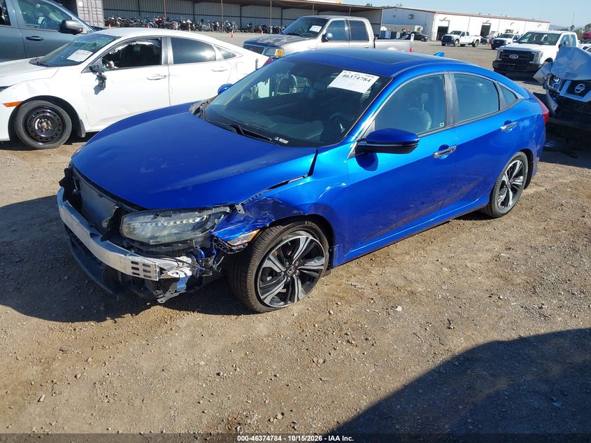 2017 Honda Civic Touring, Левый перёд, IAAI, VIN 2HGFC1F94HH641559 — фото 2