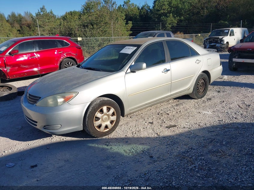 2003 Toyota Camry Le, Rear, IAAI, VIN 4T1BE32K13U194430 — photo 2