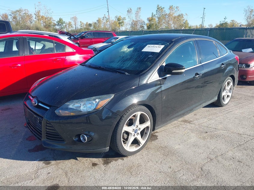 2012 Ford Focus Titanium, Удар сзади, IAAI, VIN 1FAHP3J29CL448312 — фото 2