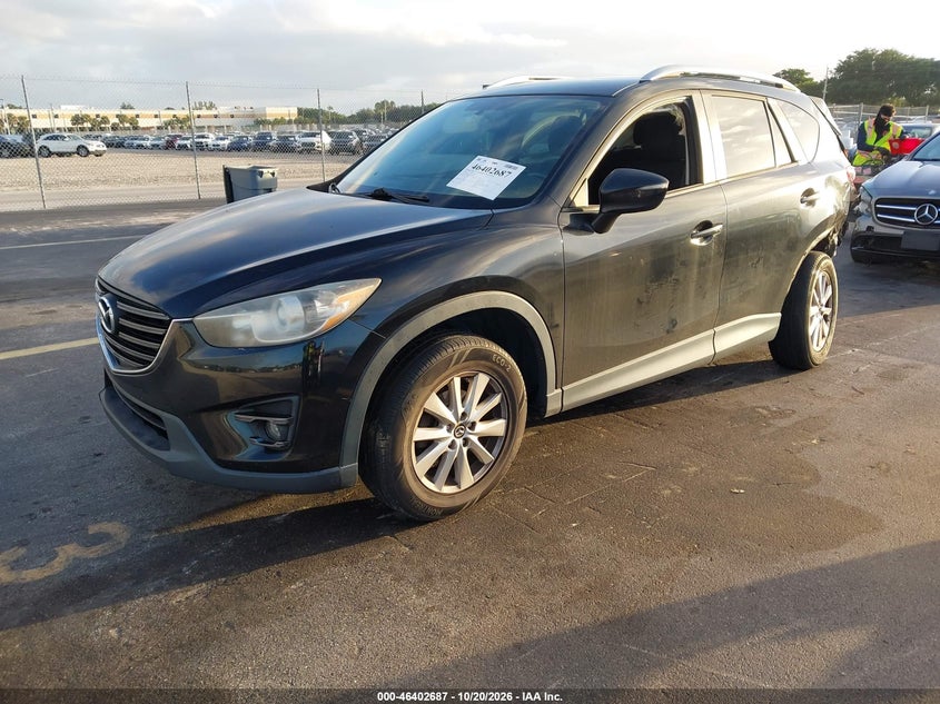 2016 Mazda Cx-5 Touring, Левый бок, IAAI, VIN JM3KE2CY9G0790262 — фото 2