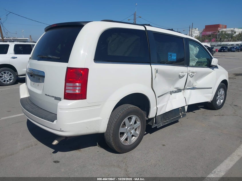 Vin: 2a4rr5d12ar460985, lot: 46911005, chrysler town & country touring 20104