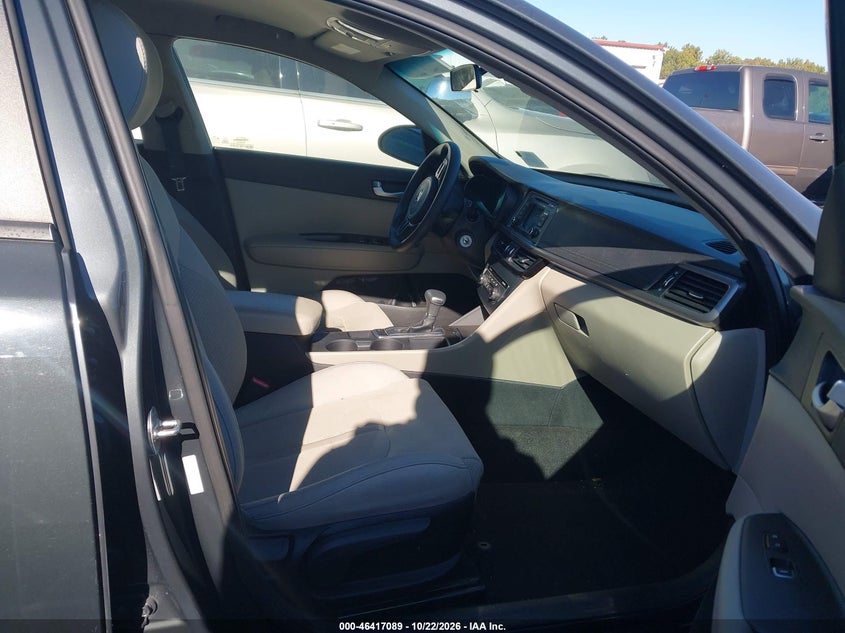 Kia Optima - фото 5