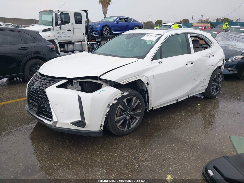 2019 Lexus Ux 250H, Left Side, IAAI, VIN JTHU9JBHXK2017619 — photo 2