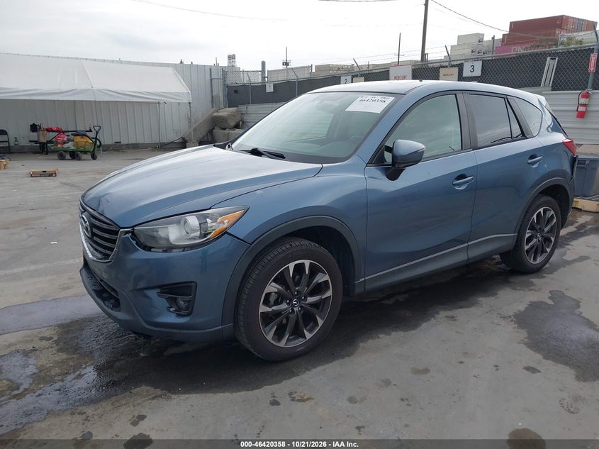 2016 Mazda Cx-5 Grand Touring, Перёд и зад, IAAI, VIN JM3KE2DY0G0801955 — фото 2
