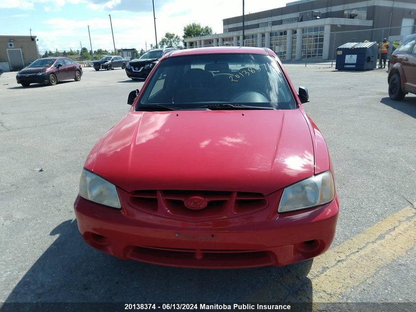 2001 Hyundai Accent Gs VIN: KMHCG35GX1U148680 Lot: 20138374