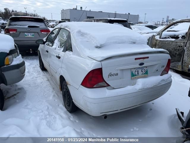 2004 Ford Focus VIN: 1FAFP38314W174416 Lot: 20141958