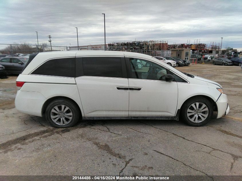 2015 Honda Odyssey Se VIN: 5FNRL5H3XFB504558 Lot: 20144486