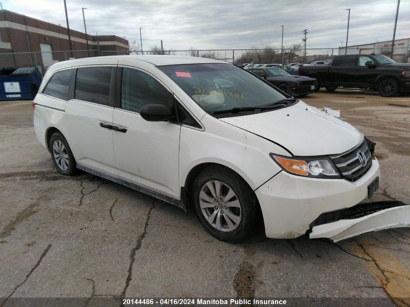 2015 Honda Odyssey Se VIN: 5FNRL5H3XFB504558 Lot: 20144486