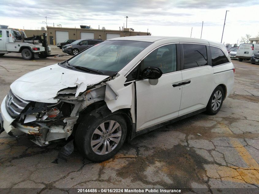 2015 Honda Odyssey Se VIN: 5FNRL5H3XFB504558 Lot: 20144486