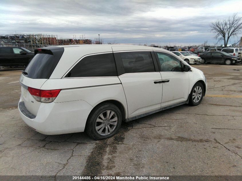 2015 Honda Odyssey Se VIN: 5FNRL5H3XFB504558 Lot: 20144486