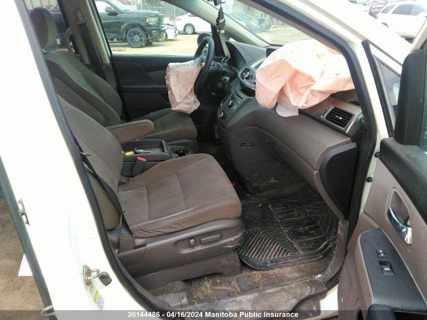 2015 Honda Odyssey Se VIN: 5FNRL5H3XFB504558 Lot: 20144486