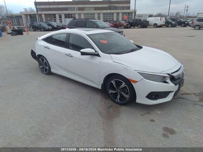 2018 Honda Civic Touring VIN: 2HGFC1F96JH100101 Lot: 20153059