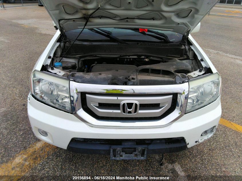 2011 Honda Pilot Touring VIN: 5FNYF4H98BB501590 Lot: 20156894