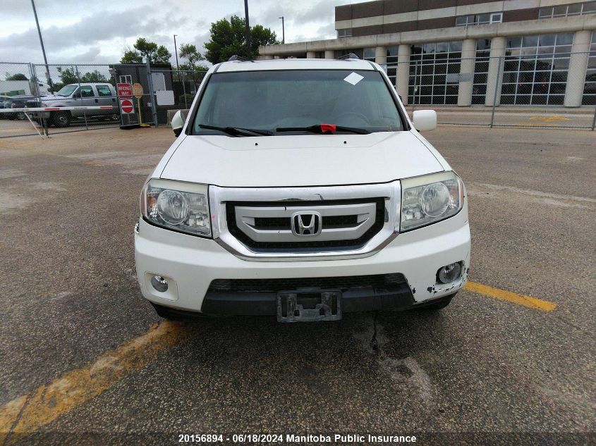 2011 Honda Pilot Touring VIN: 5FNYF4H98BB501590 Lot: 20156894