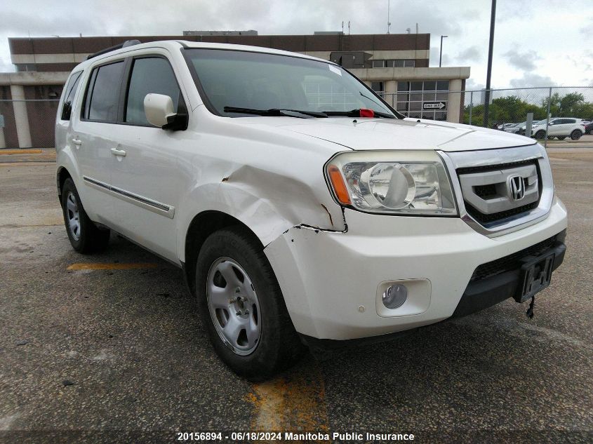 2011 Honda Pilot Touring VIN: 5FNYF4H98BB501590 Lot: 20156894