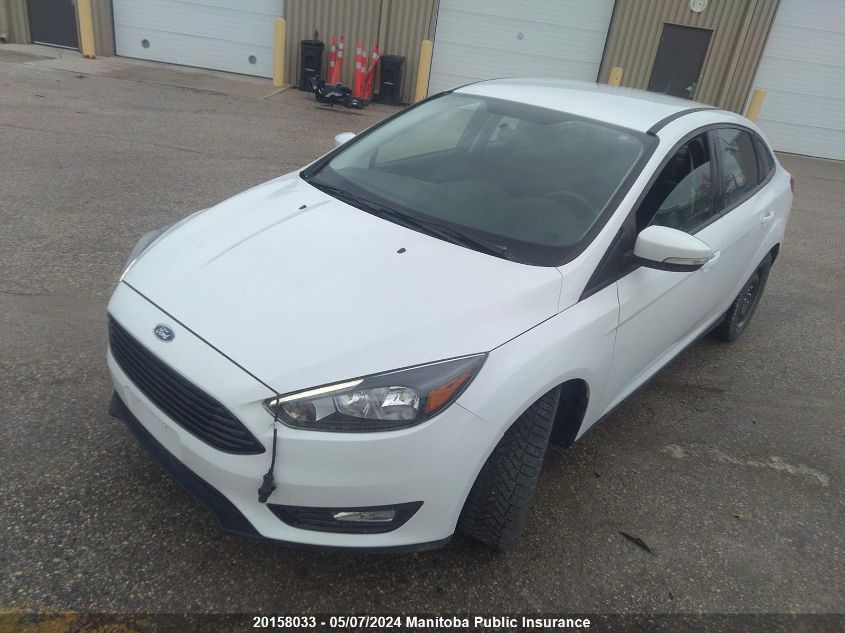 2018 Ford Focus Se VIN: 1FADP3F23JL305974 Lot: 20158033