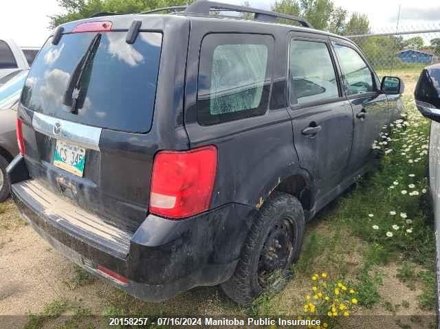 2010 Mazda Tribute Gs V6 VIN: 4F2CY9GG4AKM05216 Lot: 20158257