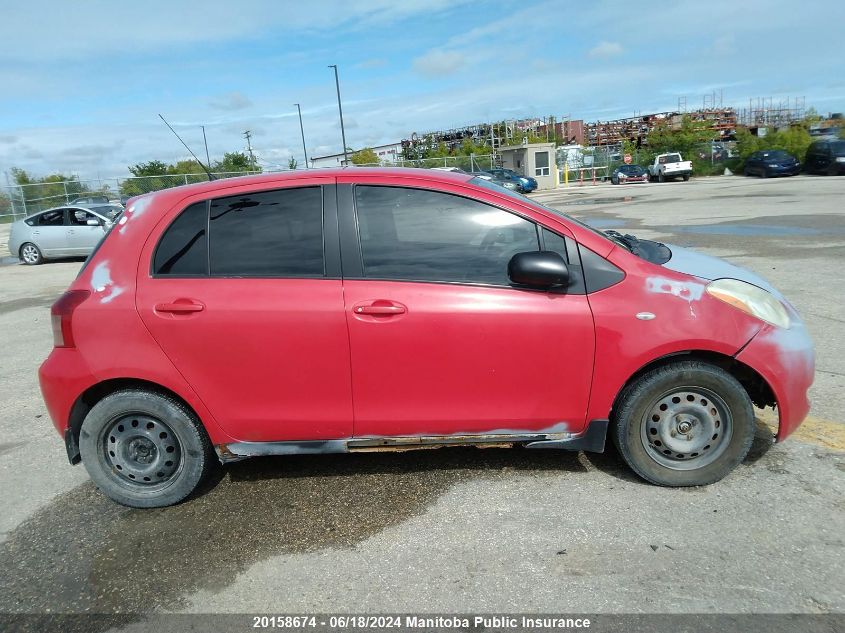 2007 Toyota Yaris Le VIN: JTDKT923975100137 Lot: 20158674