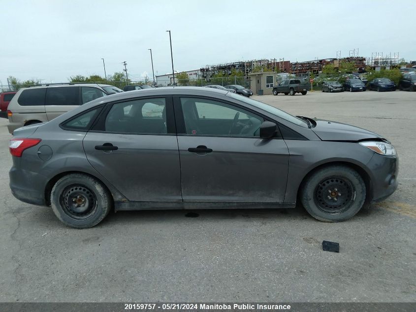 2014 Ford Focus S VIN: 1FADP3E21EL256734 Lot: 20159757