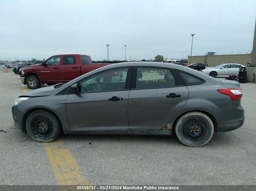 2014 Ford Focus S VIN: 1FADP3E21EL256734 Lot: 20159757