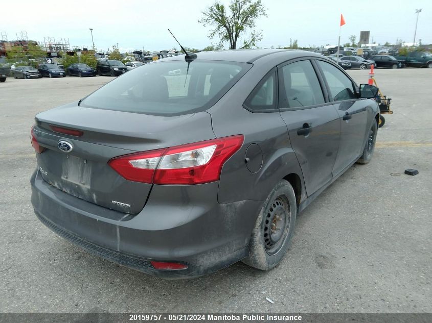 2014 Ford Focus S VIN: 1FADP3E21EL256734 Lot: 20159757