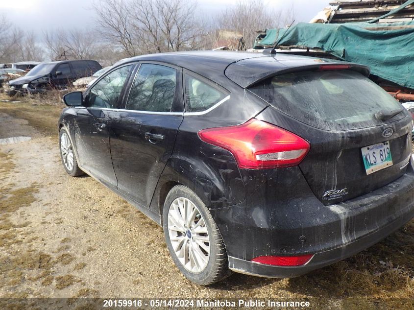 2017 Ford Focus Titanium VIN: 1FADP3N21HL280696 Lot: 20159916