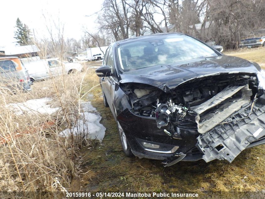 2017 Ford Focus Titanium VIN: 1FADP3N21HL280696 Lot: 20159916