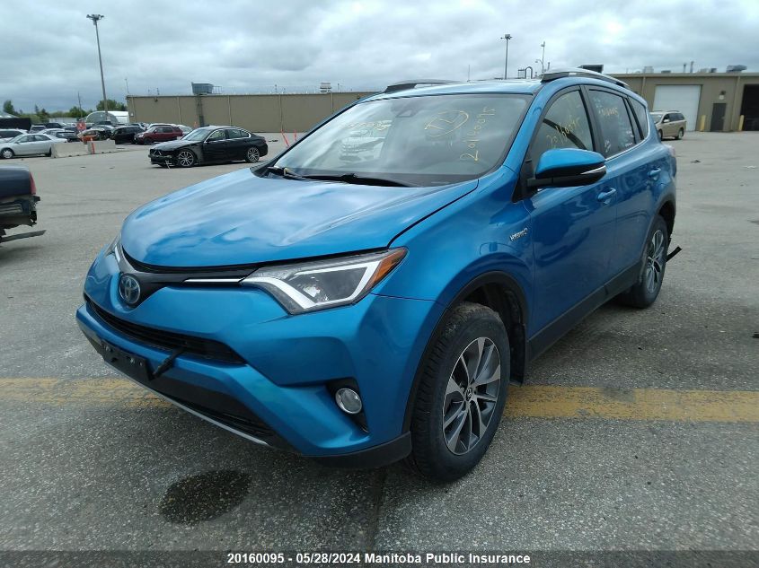 2018 Toyota Rav4 Le Hybrid VIN: JTMRJREV2JD219176 Lot: 20160095