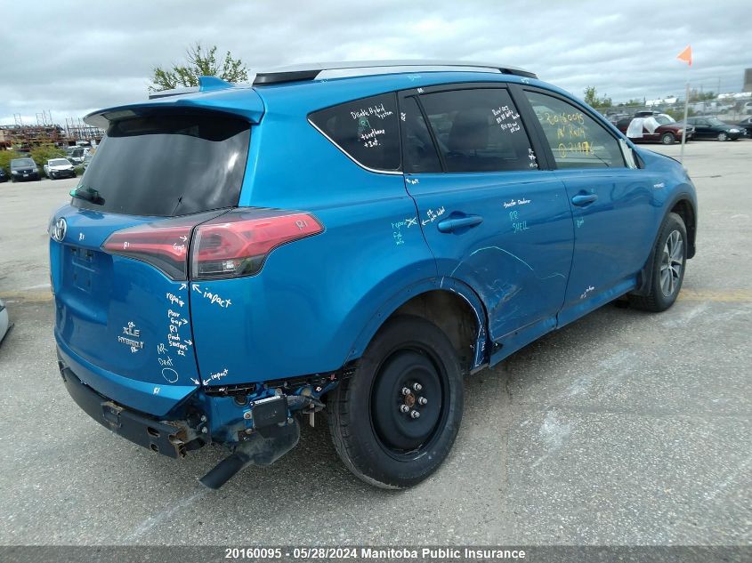 2018 Toyota Rav4 Le Hybrid VIN: JTMRJREV2JD219176 Lot: 20160095