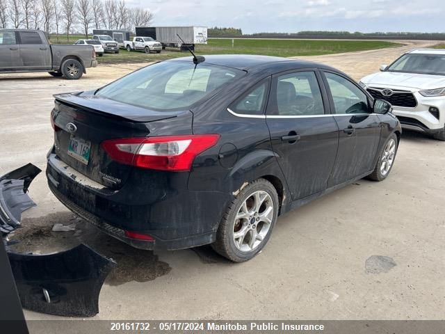 2014 Ford Focus Titanium VIN: 1FADP3J23EL331908 Lot: 20161732