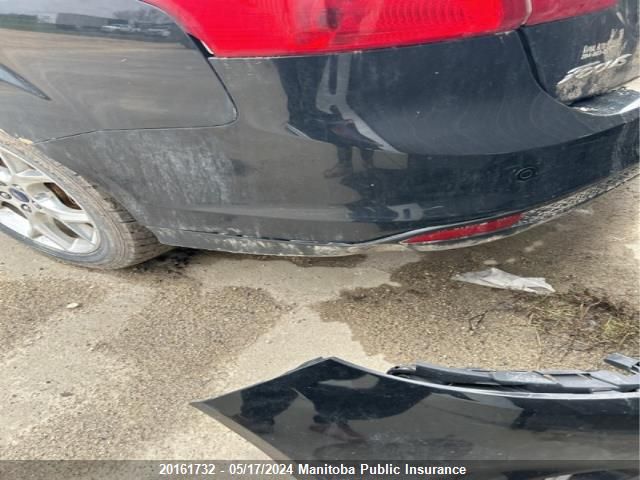 2014 Ford Focus Titanium VIN: 1FADP3J23EL331908 Lot: 20161732