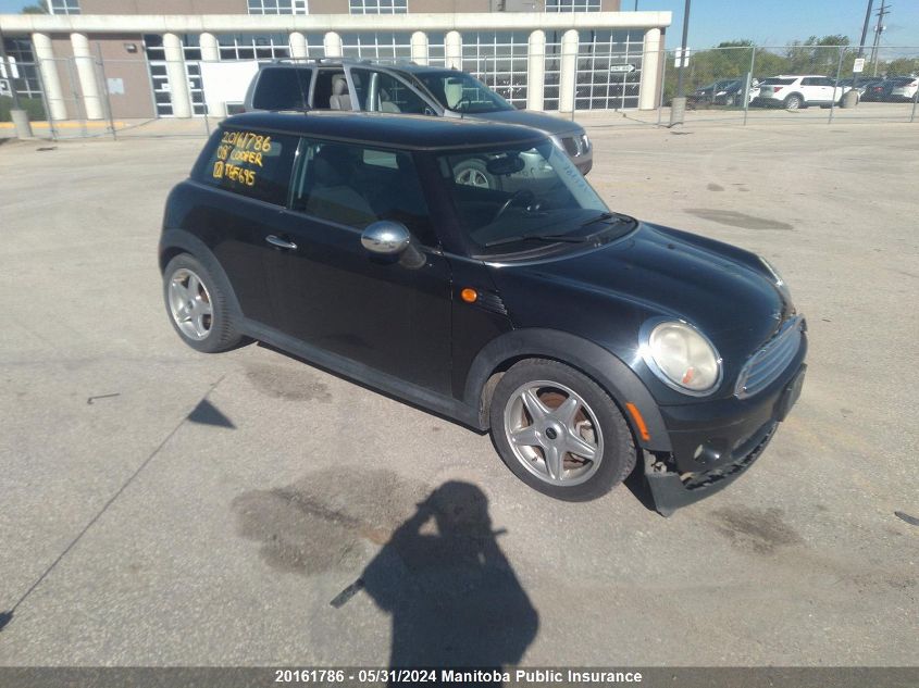 2008 Mini Cooper VIN: WMWMF33598TT65695 Lot: 20161786