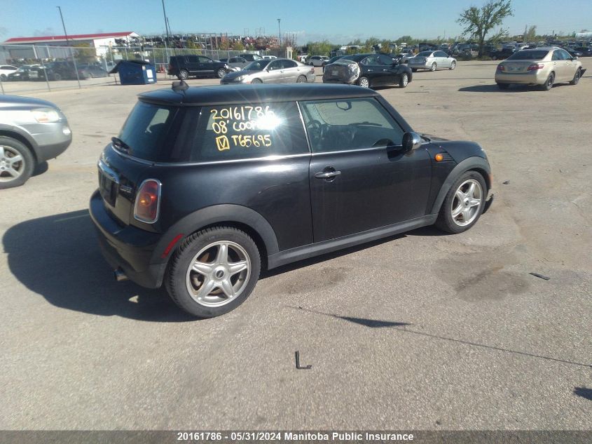 2008 Mini Cooper VIN: WMWMF33598TT65695 Lot: 20161786