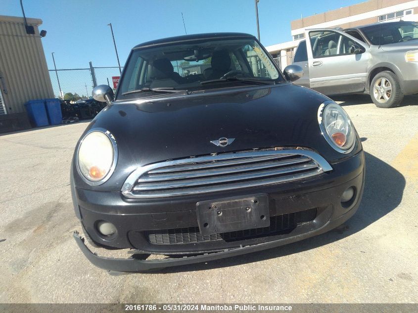 2008 Mini Cooper VIN: WMWMF33598TT65695 Lot: 20161786