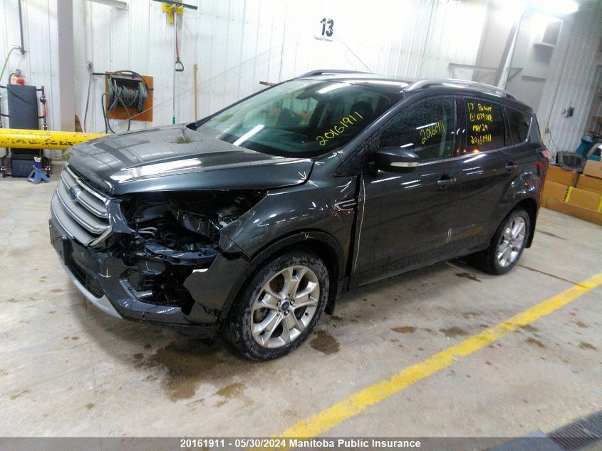 2017 Ford Escape Titanium VIN: 1FMCU9J9XHUD79768 Lot: 20161911