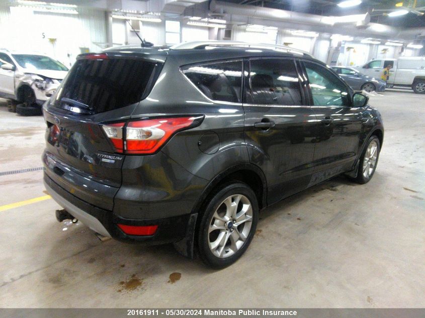 2017 Ford Escape Titanium VIN: 1FMCU9J9XHUD79768 Lot: 20161911