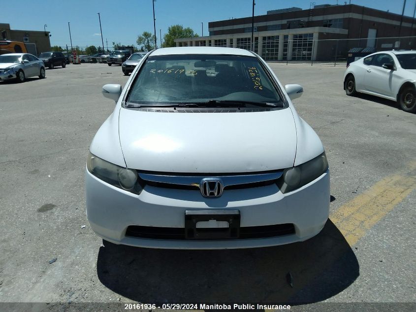 2009 Honda Civic Hybrid VIN: JHMFA362X9S800788 Lot: 20161936