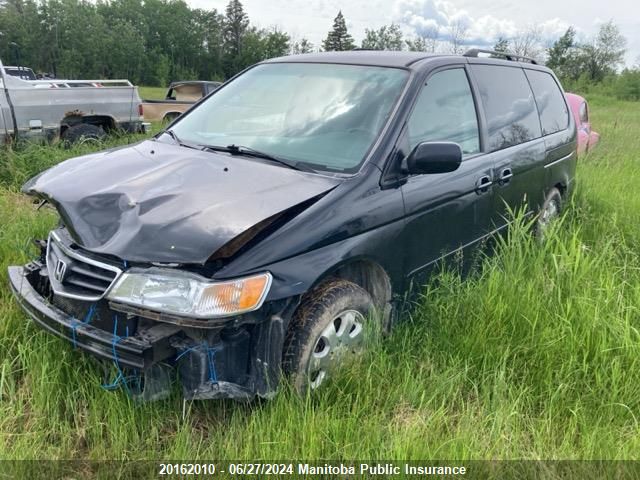 2003 Honda Odyssey Ex VIN: 2HKRL18943H003093 Lot: 20162010