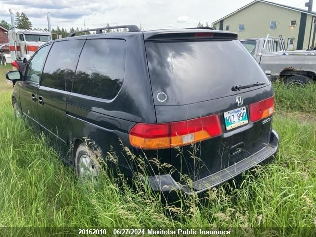 2003 Honda Odyssey Ex VIN: 2HKRL18943H003093 Lot: 20162010