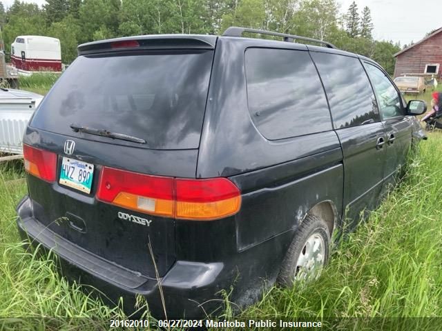 2003 Honda Odyssey Ex VIN: 2HKRL18943H003093 Lot: 20162010