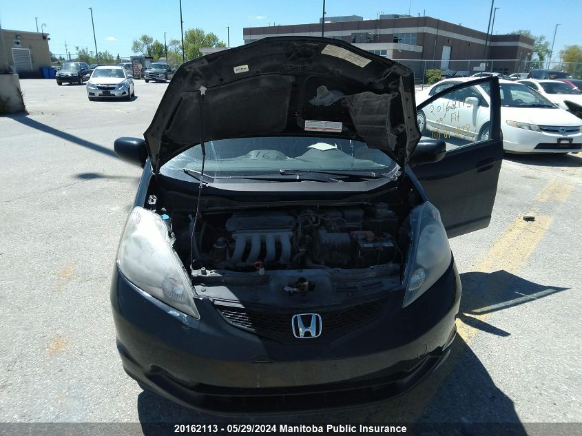 2009 Honda Fit Lx VIN: JHMGE885X9S810878 Lot: 20162113