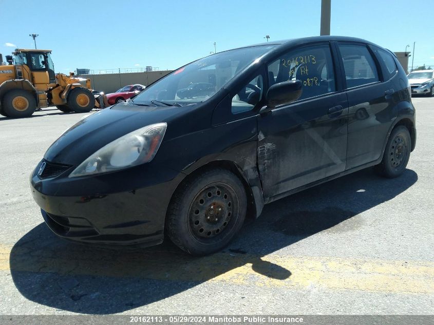 2009 Honda Fit Lx VIN: JHMGE885X9S810878 Lot: 20162113